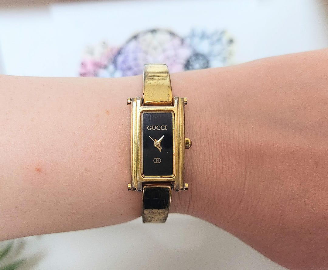 Dainty Vintage Designer Gucci Watch Gold Rectangular Dial  display picture 1