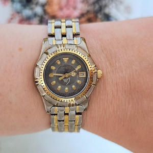 Caravelle by Bulova Womens Day/Date Two-Tone Watch Ladies Luxury Designer Bracelet Wristwatch-Birthday Gift for Her-Gold/Black Dial-High-End