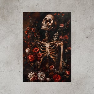 May include: A human skeleton with a skull looking upwards, surrounded by a variety of red, white, and pink flowers. The flowers are arranged in a dark, almost black background.
