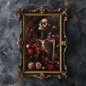 May include: A framed painting of a human skeleton with a skull, surrounded by red, white, and pink flowers. The painting is in a gold ornate frame.