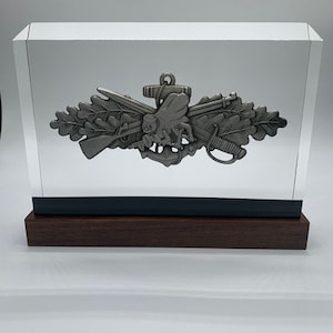 Navy Seabee, large pewter emblem in Ballistic Glass Award,  Military Promotion or Retirement Gift, Monument with clear background.