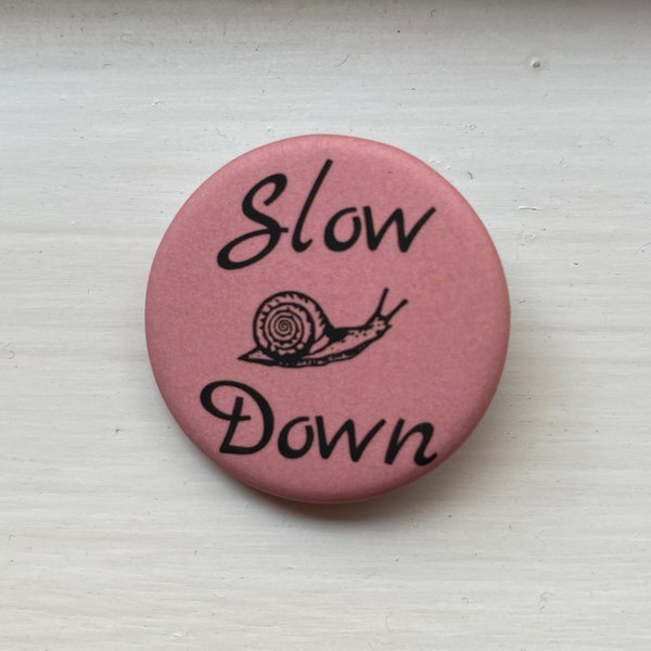 soft velvety matte slow down snail button pin ~ 1.25 inch round, soft pink ~ eco-friendly recycled metal pinback button