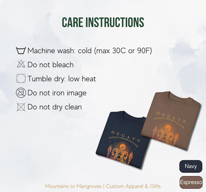 May include: Two t-shirts with a graphic print of a woman's face with flames and the text "H-E-CATE MOONLIT CROSSROADS TOUR". The t-shirts are available in navy and espresso colors. Care instructions are listed on the left side of the image. Machine wash cold, tumble dry low heat, do not bleach, iron, or dry clean.