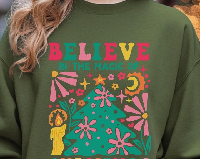 Believe in the Magic of Christmas, festive apparel, cozy sweatshirt, whimsical clothing, unique gifts, Christmas sweater, holiday sweatshirt