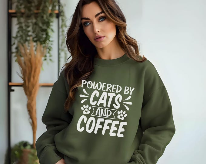 Powered by Cats and Coffee, cat lover gift, cat mom shirt, funny cat apparel, cat lover hoodie, coffee lover shirt, cat-themed gift