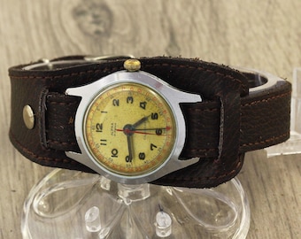 Reloj de pulsera vintage Alpha Calendar de los años 50, fabricado en Suiza, Louvic