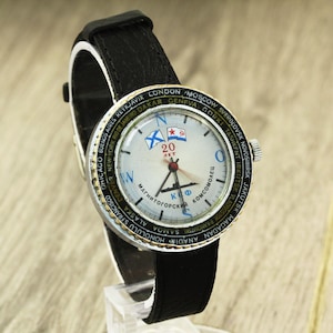Raketa 20 year commemorative Magnitogorsk Komsomolets Northern fleet world time mechanical wristwatch 2609.H caliber