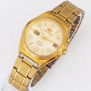 Orient 3 stars EM4V-A0 CA stainless steel automatic Japan wristwatch day/date