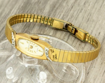 Croton quartz womens ladies Swiss made gold plated wristwatch with diamonds