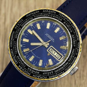 Raketa 2628 world time rare USSR Soviet men's wristwatch PChZ day&date blue dial