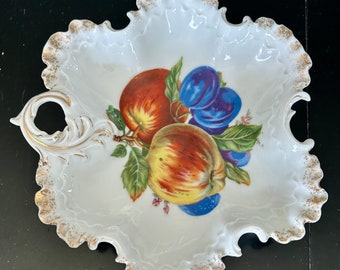 Very pretty vintage 1950’s hand painted porcelain dish with gold scalloped edges.