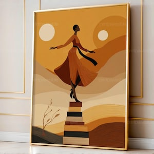 May include: Abstract art print featuring a woman in an orange dress, balancing on a stack of books. The artwork has a warm color palette with shades of orange, brown, and yellow. The print is framed in a gold frame and includes the text "printpawssible".