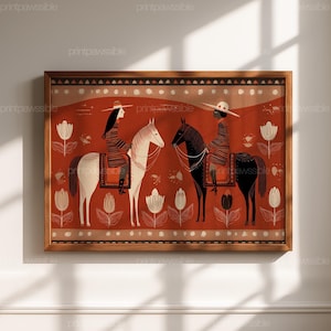 May include: A framed art print featuring two riders on horseback, one white and one black, set against a red background with floral and geometric patterns. The riders wear hats and striped clothing. The artwork is in a wooden frame.
