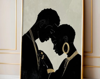 May include: A framed art print featuring a black silhouette of a couple in an embrace. The artwork has gold accents on jewelry and a neutral background. The frame is gold.