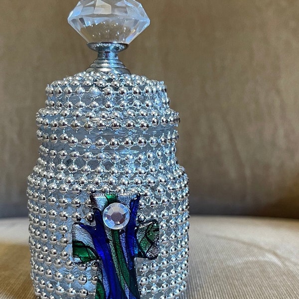 Bedazzled glass Jar with silver beads and large jewel on a nonremoveable top.