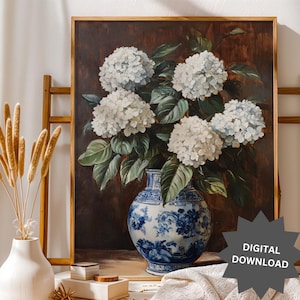 May include: A painting of a bouquet of white hydrangeas in a blue and white porcelain vase. The vase has a floral pattern and is sitting on a brown surface. The background is a dark brown.