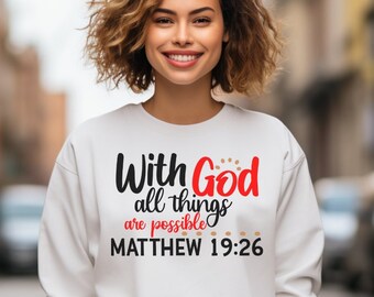 May include: White sweatshirt with the text "With God all things are possible Matthew 19:26" in black and red lettering.