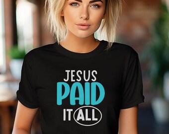May include: Black t-shirt with the text "Jesus Paid It All" in white and blue lettering.