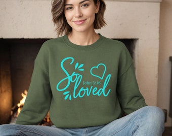 May include: A green sweatshirt with a turquoise design that says "So loved" with a heart and the text "John 3:16".