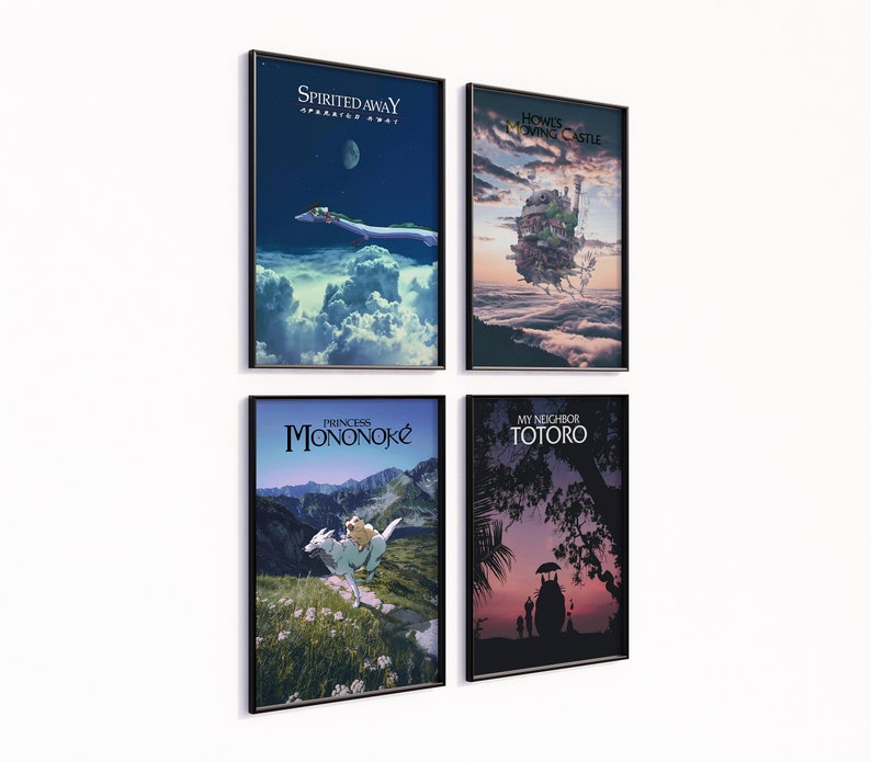 May include: Four framed art prints featuring scenes from animated films. The prints include "Spirited Away," "Howl's Moving Castle," "Princess Mononoke," and "My Neighbor Totoro." Each print has a black frame and is displayed against a white wall.