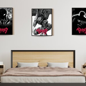 May include: Three framed black and white illustrations of a character from the anime series "Berserk". The character is depicted in different poses, including a full-body shot, a close-up of the character's face, and a silhouette of the character. The title of the series, "Berserk", is written in Japanese characters in red at the bottom of each illustration.