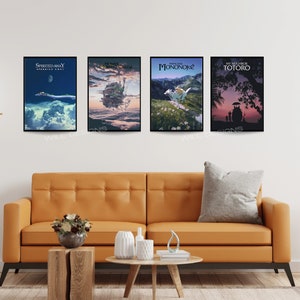 May include: Four framed art prints featuring scenes from animated films, including "Spirited Away," "Howl's Moving Castle," "Princess Mononoke," and "My Neighbor Totoro." The prints are displayed above an orange sofa in a living room setting.