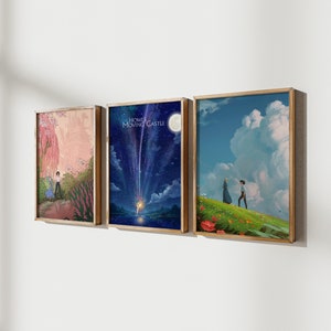 May include: Three framed prints of scenes from the animated film Howl's Moving Castle. The first print shows a pink and blue castle in a forest. The second print shows a blue sky with a shooting star and a full moon. The third print shows a couple walking on a green hill with a blue sky and white clouds.