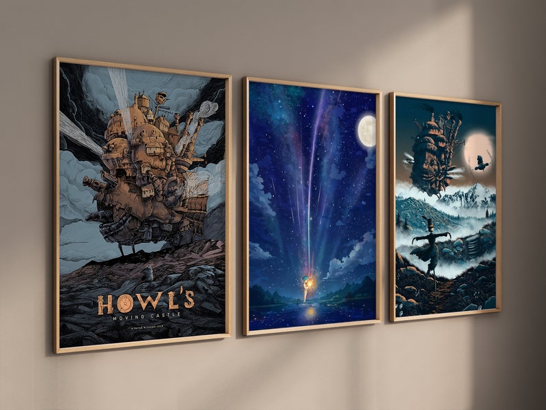 May include: Three framed art prints featuring scenes from the animated film Howl's Moving Castle. The first print shows the moving castle in the sky, the second print shows a shooting star in the night sky, and the third print shows a figure standing in a foggy landscape.