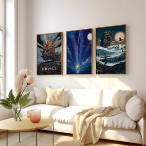 May include: Three framed art prints featuring scenes from the animated film Howl's Moving Castle. The first print shows the castle in the sky, the second print shows a shooting star, and the third print shows a figure in a field with the castle in the background.