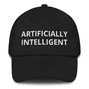 May include: A black baseball cap with the words "ARTIFICIALLY INTELLIGENT" embroidered in white across the front. The cap has a curved brim and a button on top.