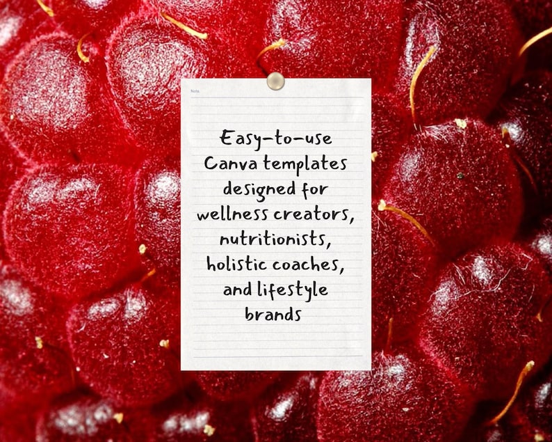 May include: A close-up of a red raspberry with a small, white notepad pinned to it. The notepad has handwritten text that reads: "Easy-to-use Canva templates designed for wellness creators, nutritionists, holistic coaches, and lifestyle brands."