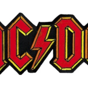 May include: Embroidered patch featuring the band name "AC/DC" in bold, red, block letters with a yellow outline. A yellow lightning bolt is centered between the "C" and "D". The patch has a black background and a black border.