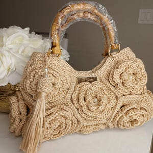 Beige Crochet Handbag with 3D Roses | Bamboo Handle, Tassel Detail, Elegant Accessory