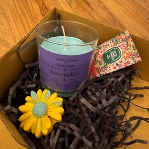 Container candle with fortune message