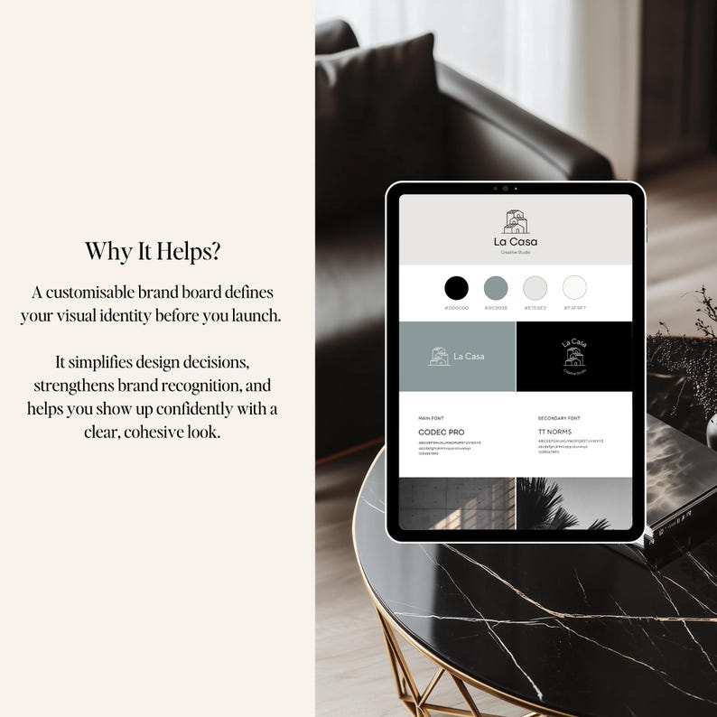 May include: A digital tablet displays a brand board with the text "La Casa" and color swatches. The tablet is on a black marble table with gold legs. Text on the tablet reads "Why It Helps?" and "A customisable brand board defines your visual identity before you launch."