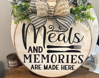 Memories and meals are made here wooden round sign