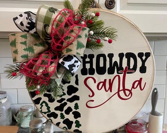 Howdy Santa with the tree and cow print  wooden round sign