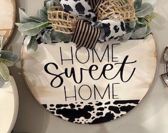 Home sweet home rustic cow print wooden round sign