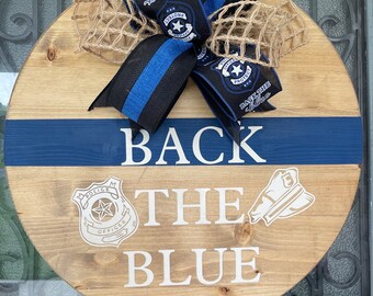 Back the blue with a blue line wooden sign
