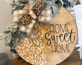 Home sweet home with cheetah print wooden round sign