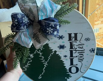 Hello winter with snowflakes wooden Round sign