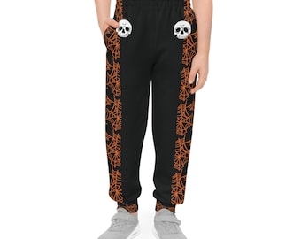 Pantalon de jogging d'Halloween pour jeune avec toile d'araignée et têtes de mort