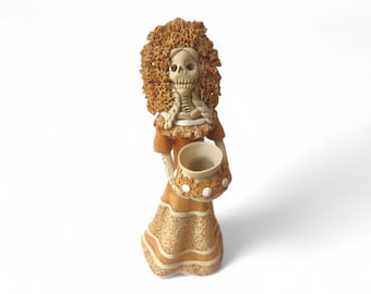 Catrina de barro, figuras de Catrina, Catrina mexicana, mulher esqueleto, Catrina com vaso, Catrina com flores, Catrina feita à mão, mitologia mexicana
