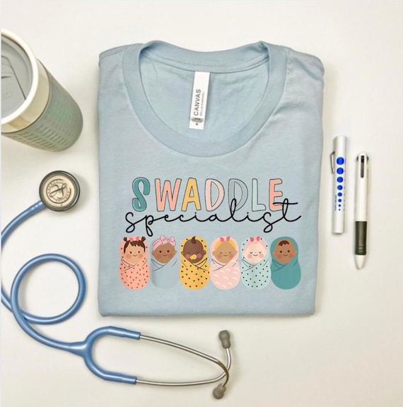 Swaddle specialist Shirt, NICU nurse shirt, L&D shirt, Newborn Nurse shirt