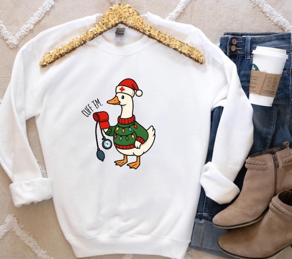 Cuff ‘Em Nurse Goose Christmas Sweatshirt • Funny Nurse Holiday Crewneck • Nurse Christmas Gift •Healthcare Sweater Unisex Winter Sweatshirt