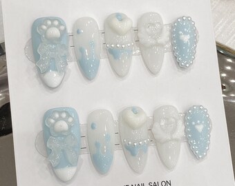 Ongles en gel de luxe bleu patte de chat avec noeud mignon | Appuyez sur les ongles | Ongles 100 % faits main | Créations d'ongles | Faux ongles | Ongles moyens en forme d'amande