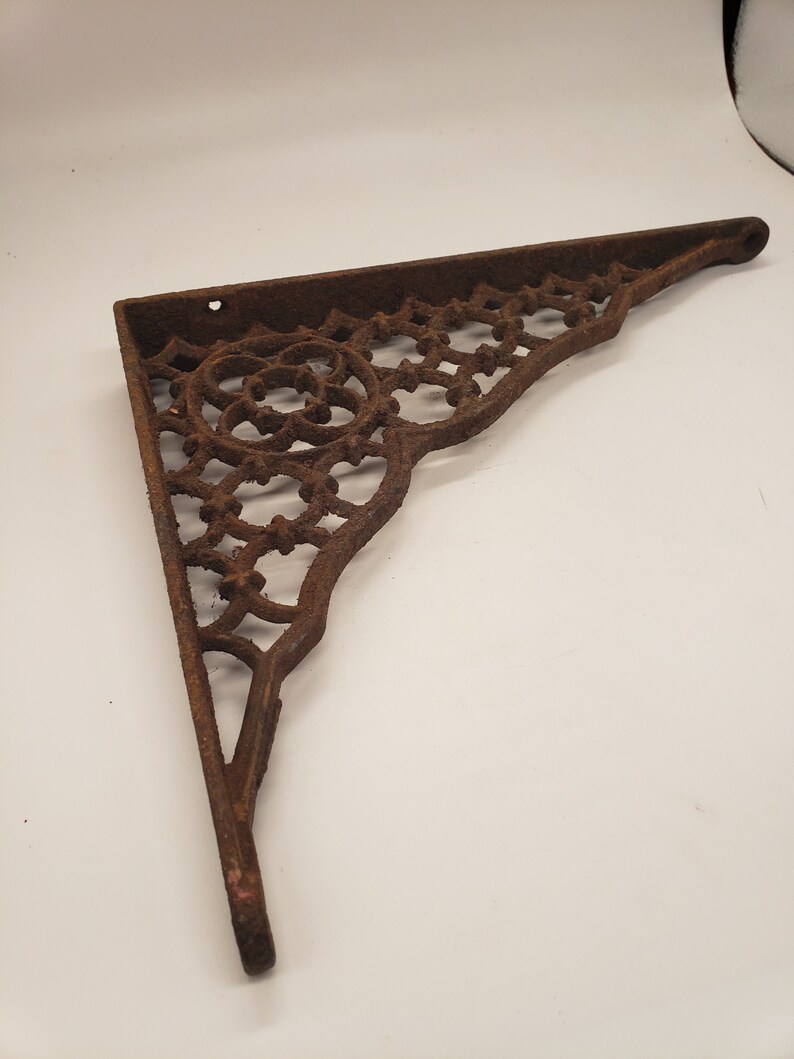 Victorian Era Cast Iron Shelf Bracket, Ornate Design, Rusty Metal