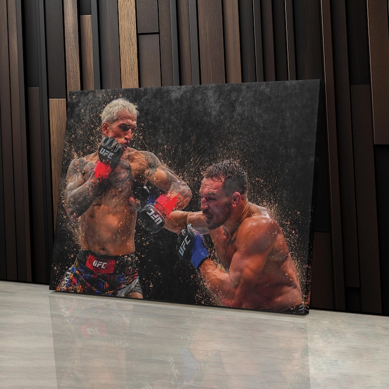 May include: Two men wearing boxing gloves and shorts are in a boxing match. The man on the left is wearing red and blue gloves and the man on the right is wearing blue gloves. The background is a dark gray with a water effect.