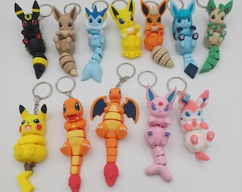 Articulated Pocket Monster Keychains – 4 Inch Flexible Creature Figurines – Starter Set & Evolution Collection Gift