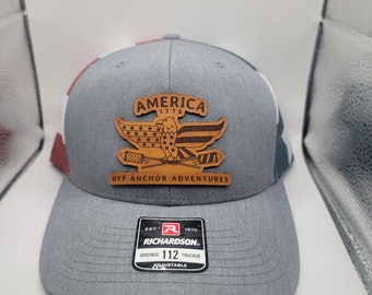 American flag trucker hat with leather patch.